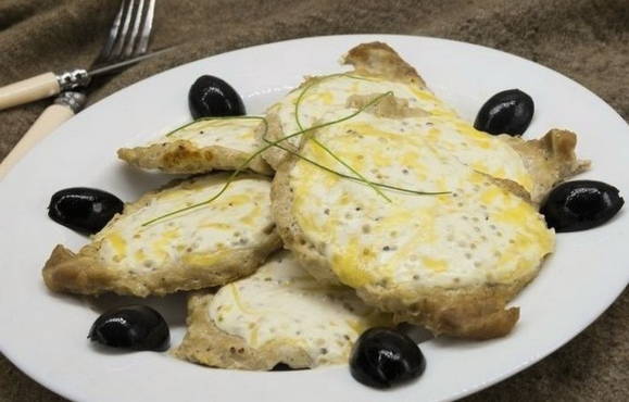 Pork chops in the oven with cheese