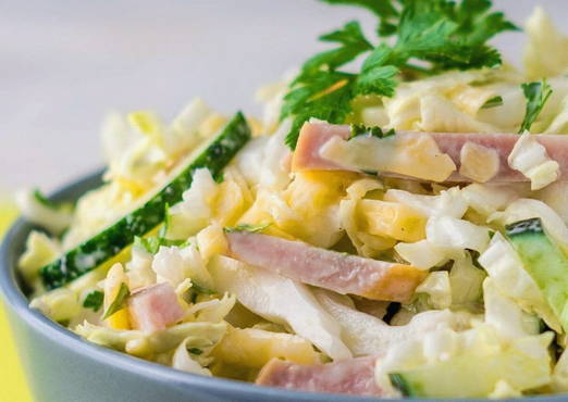 Salad with ham, cheese and cucumber