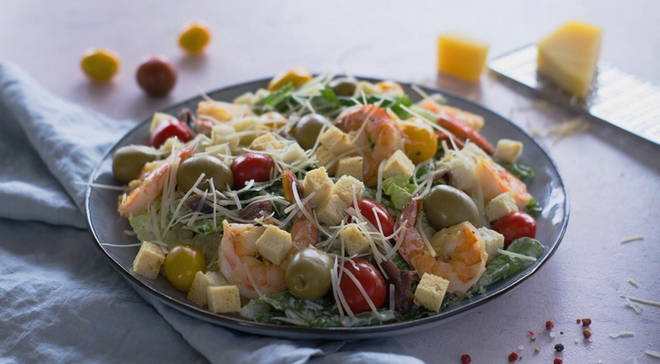 Caesar salad with king prawns