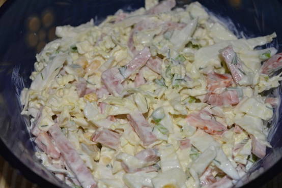 Peking cabbage and sausage salad