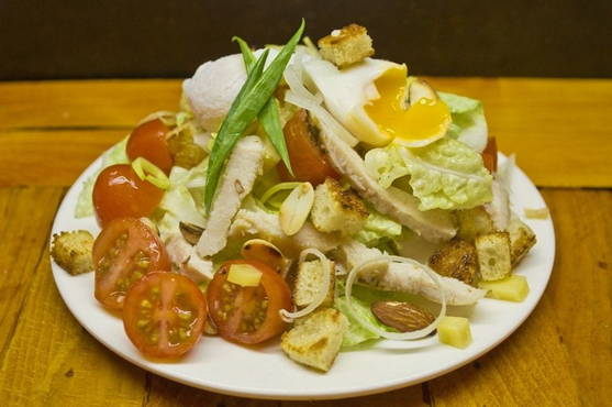 Caesar salad with egg and chicken