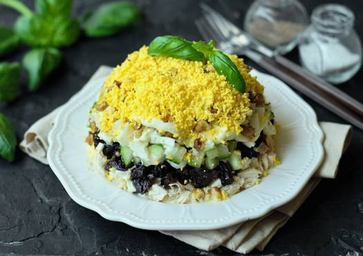 Salad with chicken prunes and mushrooms