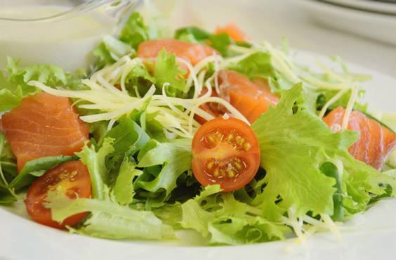 Caesar salad with trout