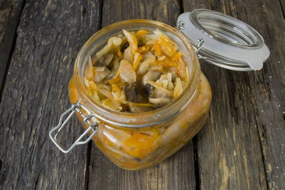 Solyanka for the winter with mushrooms and cabbage in jars