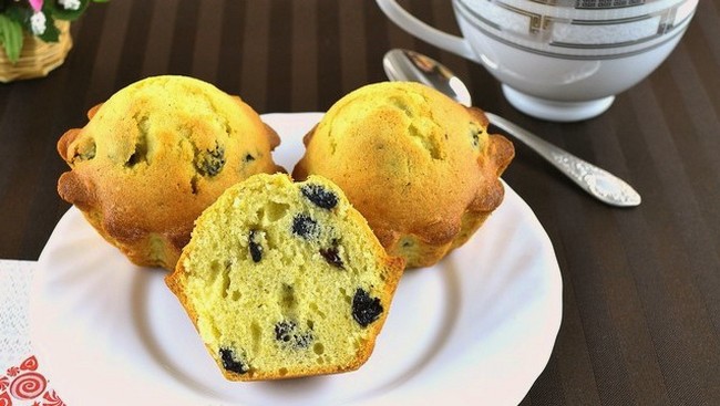 Cupcake with raisins on margarine