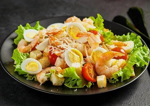 Caesar salad with shrimps without mayonnaise