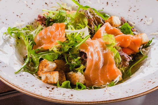 Caesar salad with salmon