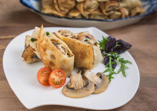 Pancakes with mushrooms and chicken