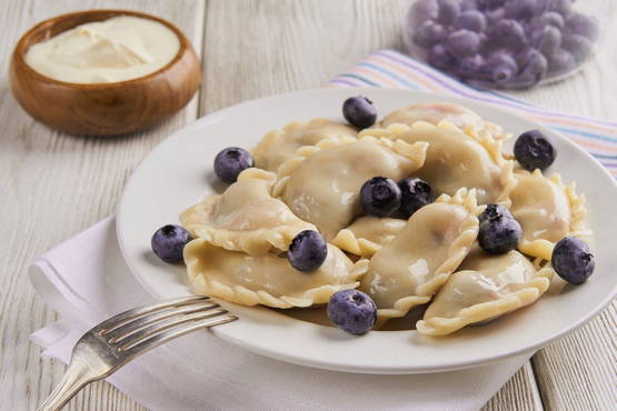 Dumplings with blueberries in a slow cooker