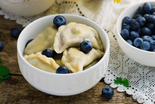 Dumplings with blueberries and whey