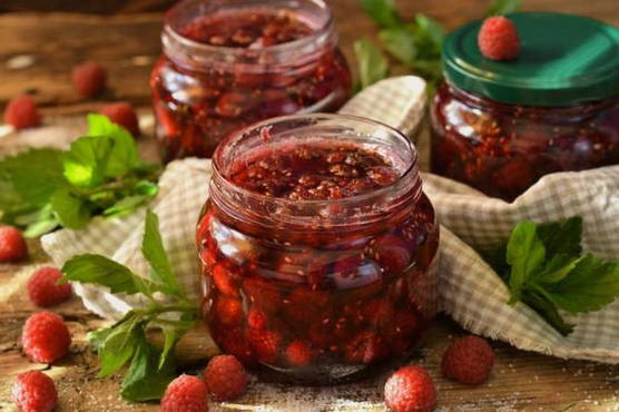 Thick raspberry jam with whole berries