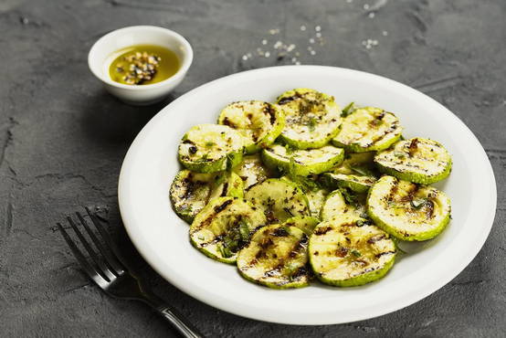 Grilled zucchini marinated in sour cream