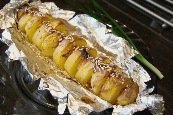 Potatoes in foil on the grill