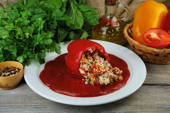 Stuffed peppers in tomato sauce