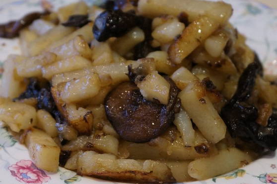 Fried boletus mushrooms with potatoes