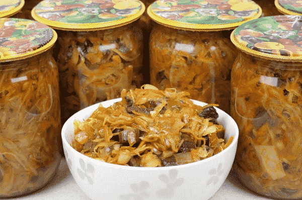 Solyanka for the winter with mushrooms and cabbage