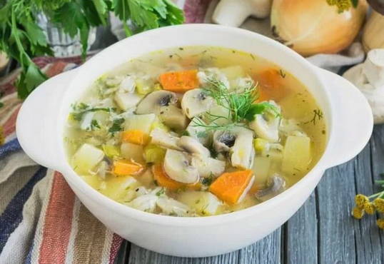 Fresh porcini mushroom soup with rice