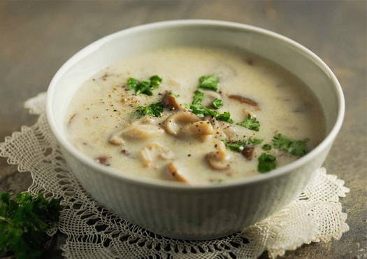 Fresh porcini mushroom soup with cheese