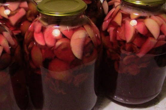 Plum and pear compote in a 3 liter jar for the winter