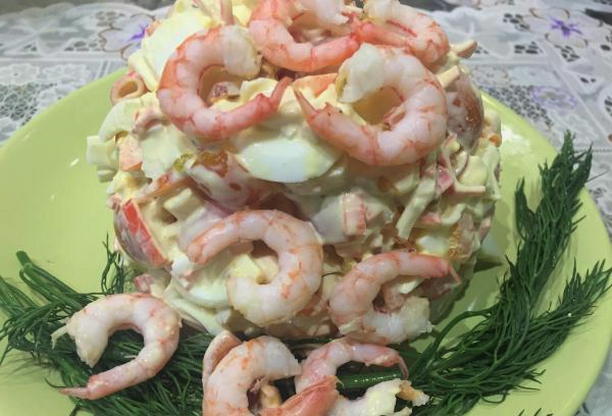 Shrimp salad with crab sticks and tomatoes