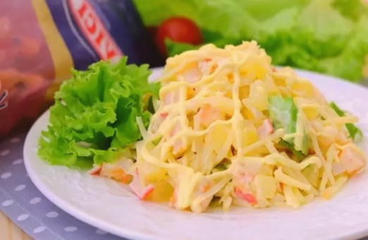 Shrimp salad with crab sticks and pineapple