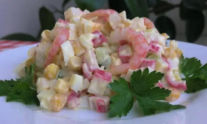 Shrimp salad with crab sticks, corn and eggs