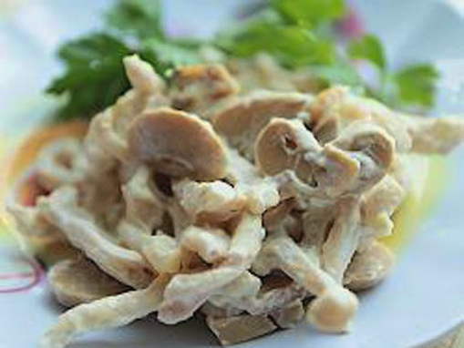 Salad with squid and pickled mushrooms