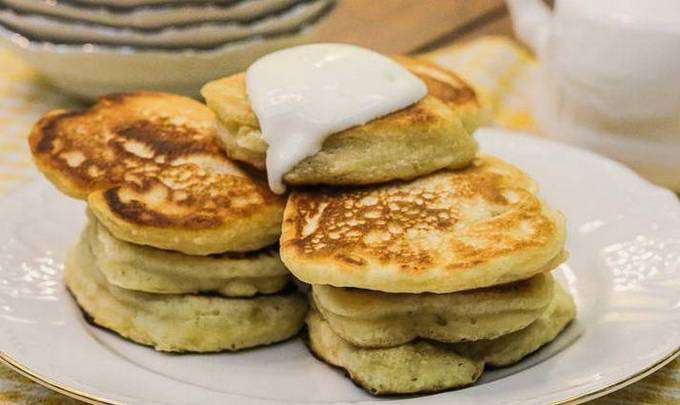 Lush pancakes on yogurt with soda