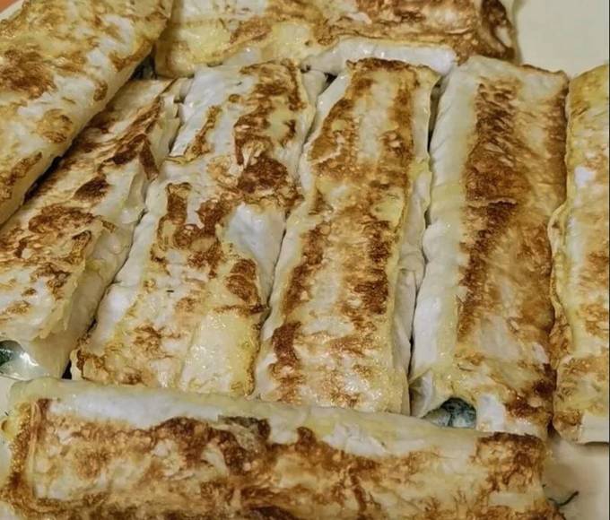 Rouleaux de pita au fromage et aux herbes