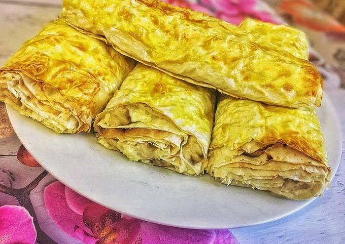 Lavash with cottage cheese and cheese in the oven