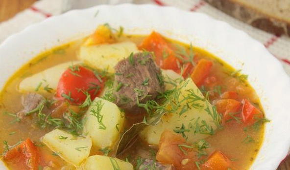 Lamb shurpa with potatoes in a saucepan