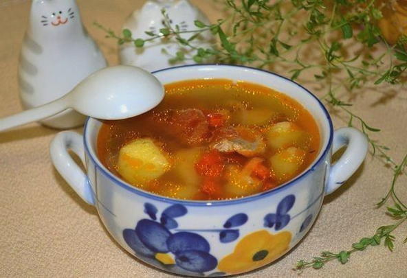 Pork shurpa on the stove in a saucepan