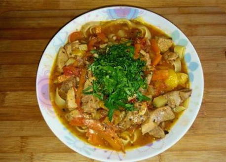 Classic chicken lagman with potatoes and noodles