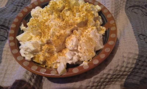 Salad with chicken, pineapple, cheese, egg and mayonnaise