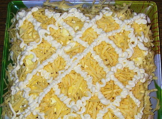 Puff salad with chicken, pineapple, cheese and egg