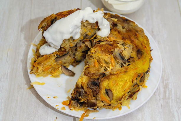 Casserole with potatoes, chicken and mushrooms in a slow cooker