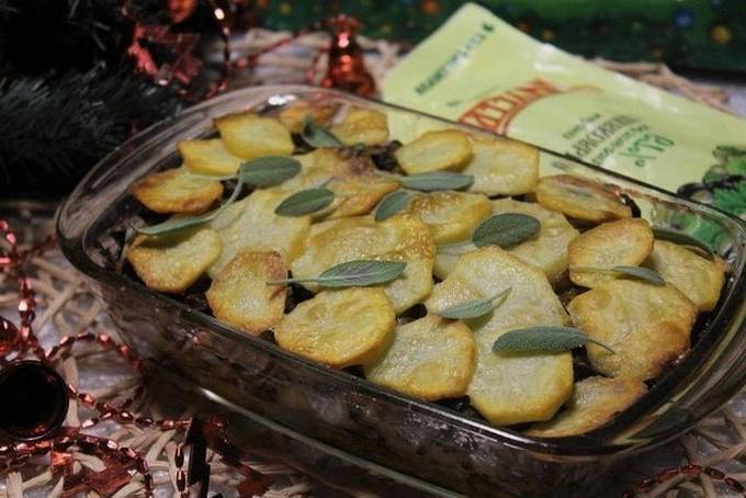 Potato, chicken and mushroom casserole in the oven