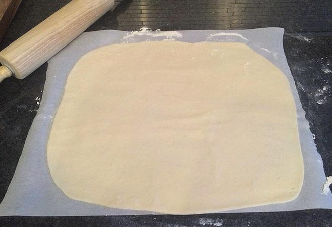 Milk dough without yeast with eggs for pizza in the oven