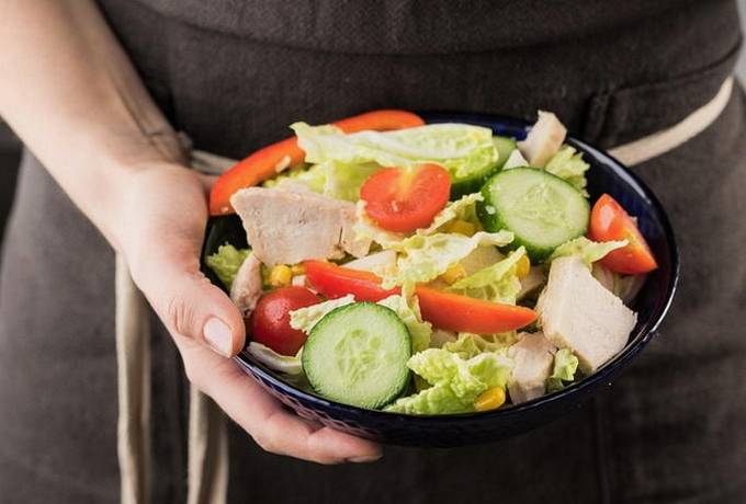 Salad with chicken, cucumber, tomatoes and Chinese cabbage