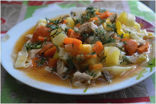 Pork lagman with noodles in a slow cooker