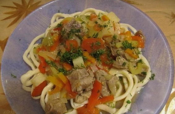 Uzbek beef lagman in a cauldron