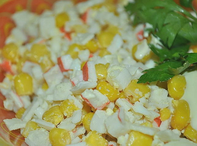 Crab salad with corn, egg and mayonnaise