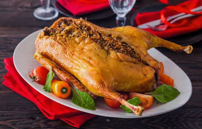 Goose stuffed with buckwheat in the oven