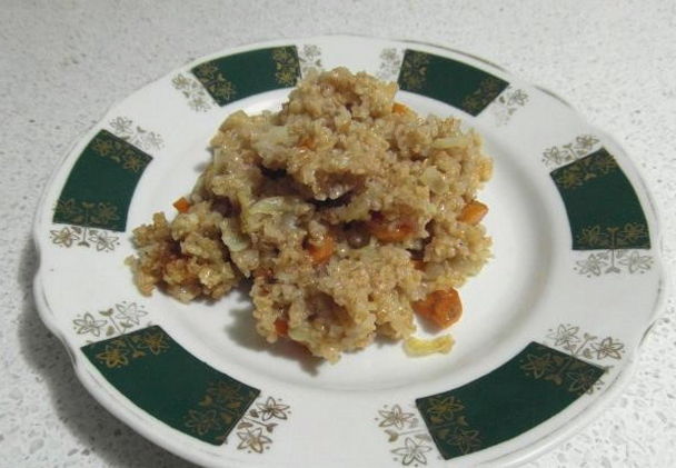 Wheat porridge in a pot in the oven