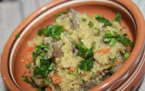 Wheat porridge with stewed meat in a slow cooker