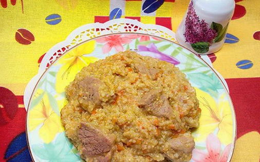 Wheat porridge on water with stew