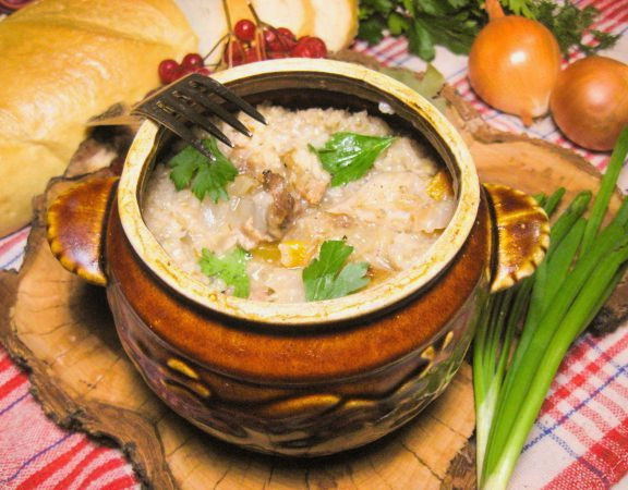 Barley porridge in a pot in the oven