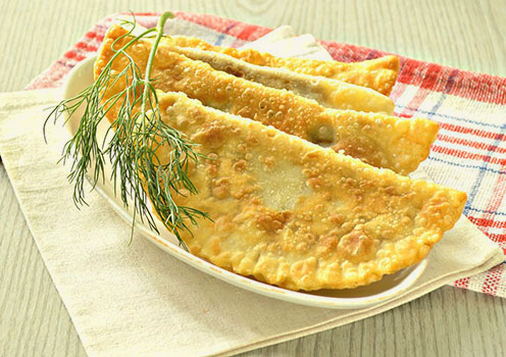 Homemade pasties with minced meat and boiling water dough