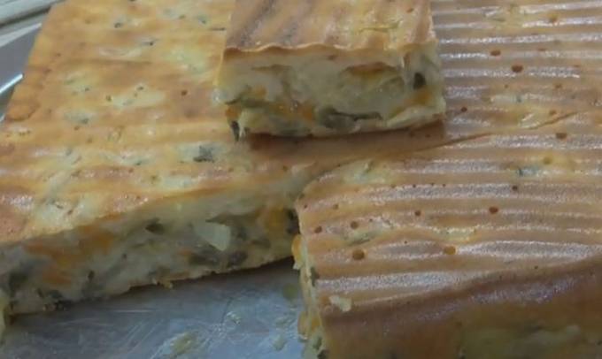 Jellied pie with cabbage and onions in the oven