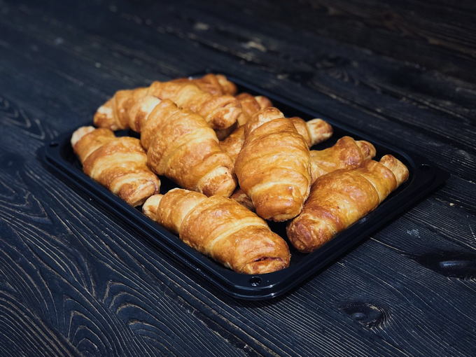 Homemade puff pastry croissants with filling